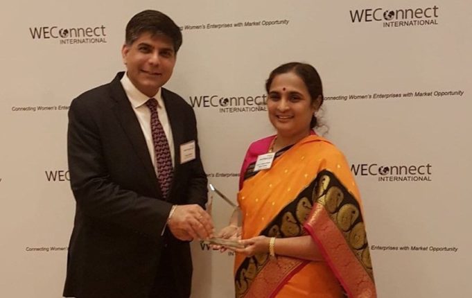 Ms. Ratna Prabha receiving an award for women entrepreneurship & empowerment